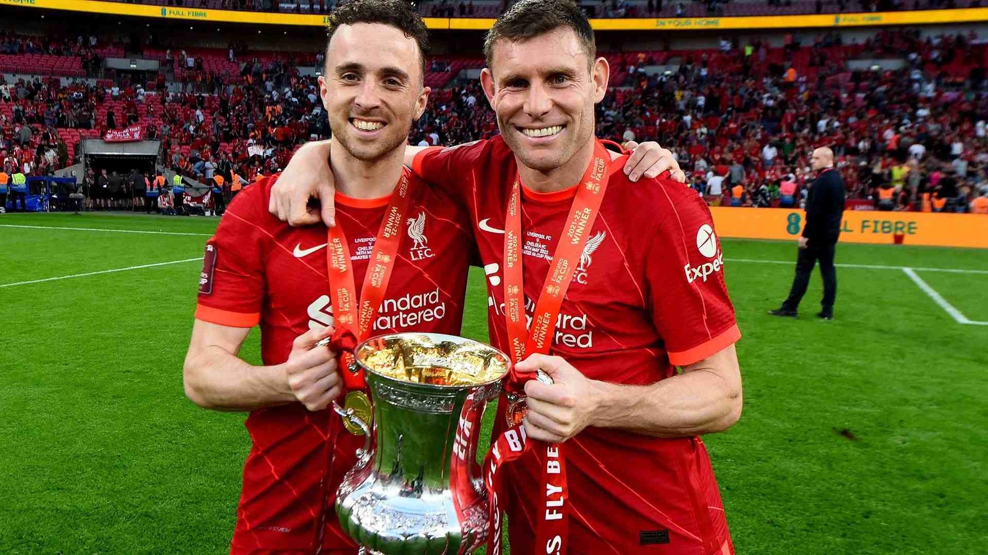 Diogo Jota and James Milner Liverpool with trophy cup